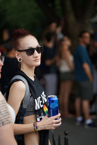 Side view of young couple wearing sunglasses