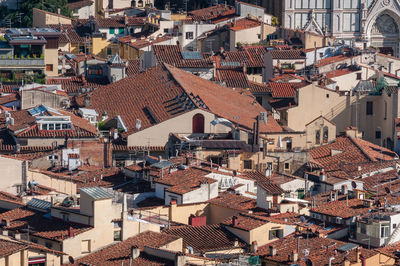 Birds eye view of red-tiled rooftops of florence medieval historic cenrte in italy