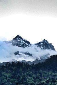 Scenic view of snow covered mountains