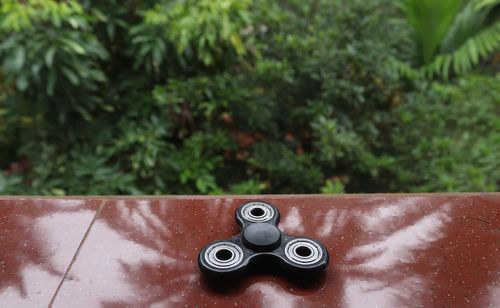 A fidget spinner placed on an open space