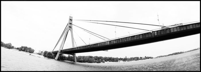 View of suspension bridge against clear sky