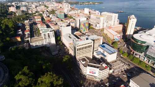 High angle view of townscape by road in city