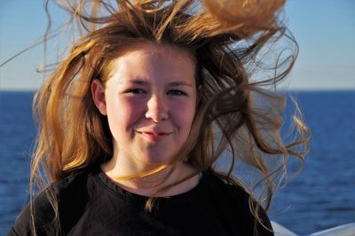 Portrait of a smiling girl in sea