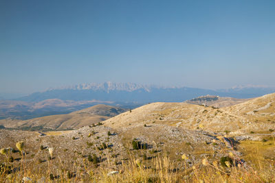 Scenic view of mountains against clear sky