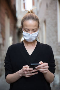 Young woman using mobile phone