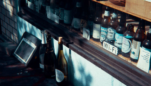 Row of bottles on display at store