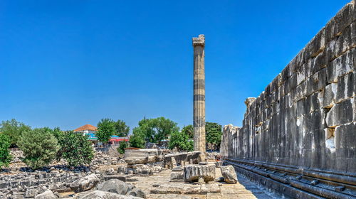 Old ruin against clear blue sky