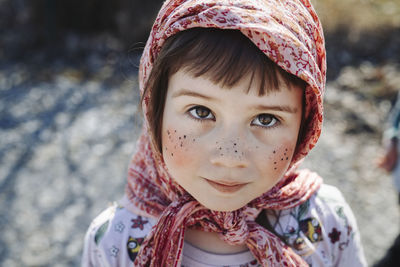 Close-up portrait of smiling girl