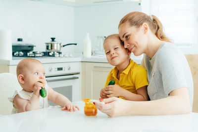 Boy and woman at home