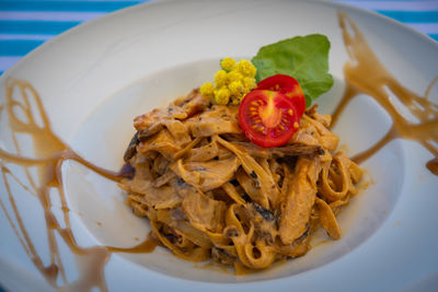 Close-up of noodles served in plate