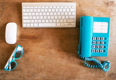 High angle view of laptop and smart phone on table