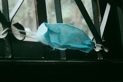 Close-up of blue metal window