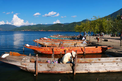 Person sitting on boat in lake