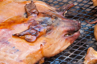 High angle view of meat on barbecue grill