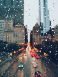 Close-up of water drops on car window