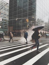 Full length of woman standing in city