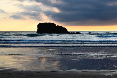 Scenic view of sea against sky during sunset