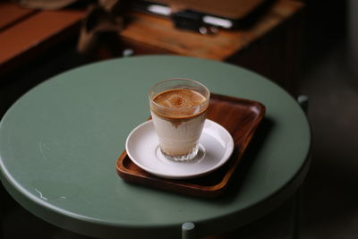 High angle view of coffee served on table