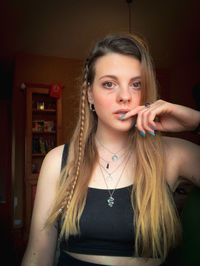 Portrait of beautiful woman at home