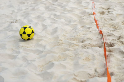 Close-up of soccer ball on snow