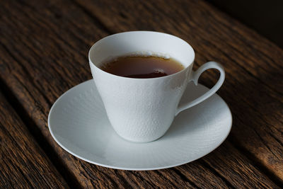 Close-up of coffee cup on table