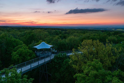 High angle view of trees against sky during sunset