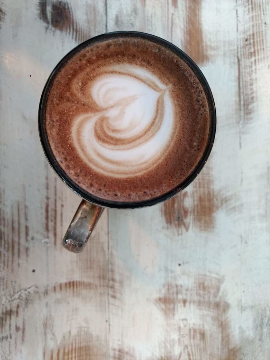 COFFEE CUP ON TABLE