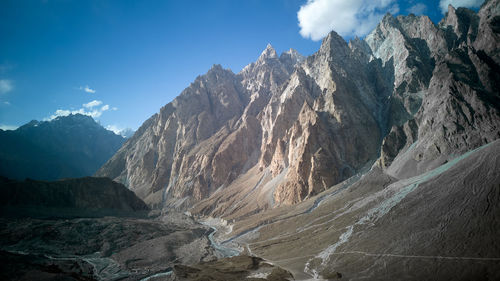 Panoramic view of passu mountains against sky