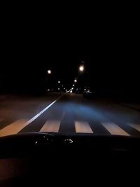 Close-up of illuminated car at night