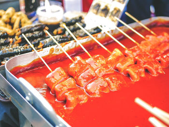 High angle view of meat on barbecue grill