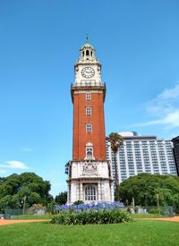 Low angle view of building against blue sky