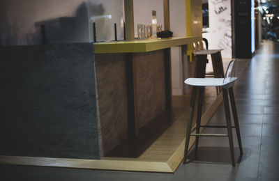 Empty chairs and table in restaurant