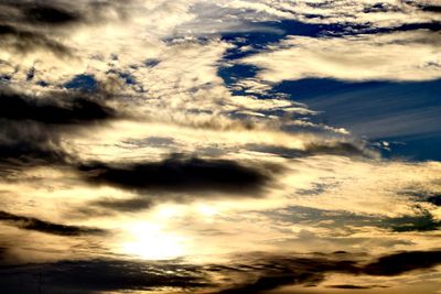 Low angle view of clouds in sky during sunset