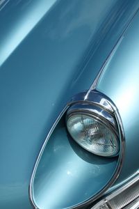 Full frame shot of blue car on side-view mirror