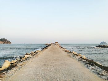 Scenic view of sea against clear sky