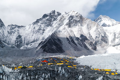 Scenic view of snowcapped mountains against sky