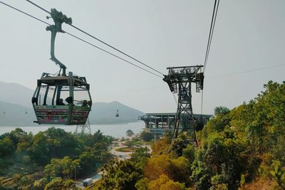 Overhead cable car against clear sky