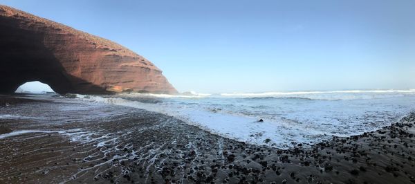 Scenic view of sea against clear sky