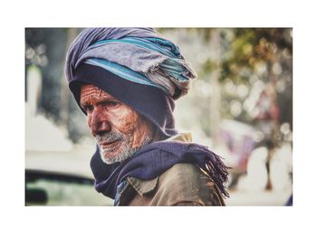 Portrait of man wearing hat outdoors