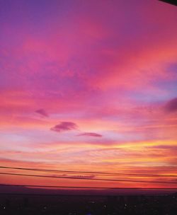 Scenic view of dramatic sky during sunset