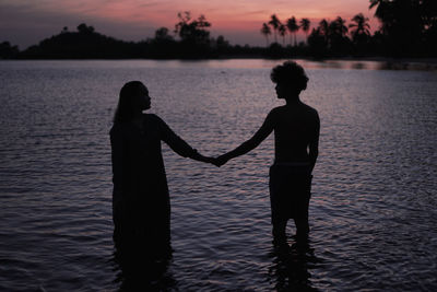 Love silhouette on the beach