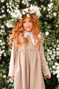 Portrait of girl wearing wreath