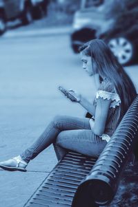 Woman sitting on seat