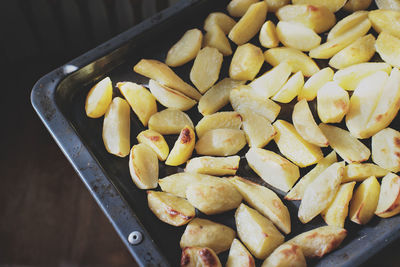 Crispy oven baked potatoes. delicious potatoes for home dinner just out of the oven. family weekend