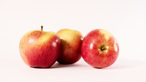 Close-up of apple against white background