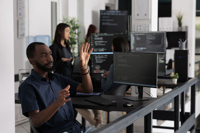 Business colleagues working in office