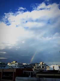 Building against cloudy sky