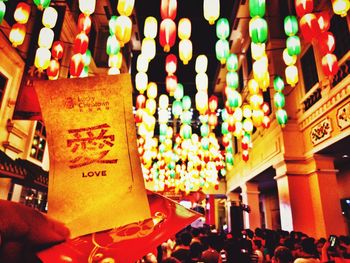 Illuminated lanterns hanging at night