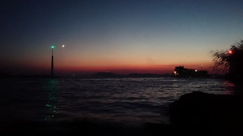 Scenic view of sea at sunset