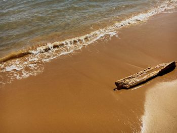 High angle view of waves on beach